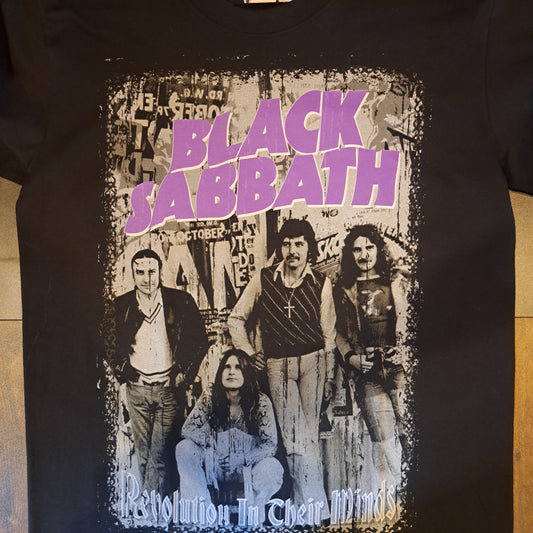 Black Sabbath t-shirt with band members and text on a dark background