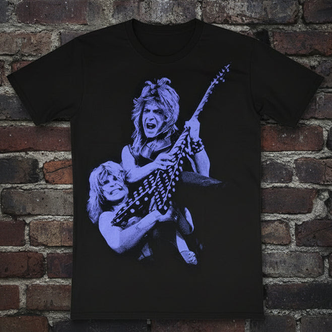 Black t-shirt with blue graphic design on a wooden surface. Randy Rhoads guitarist. Ozzy Osbourne. Front 